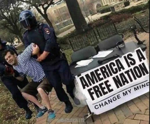 america-is-free-nation-change-my-mind-cops-arresting-free-speech.jpg